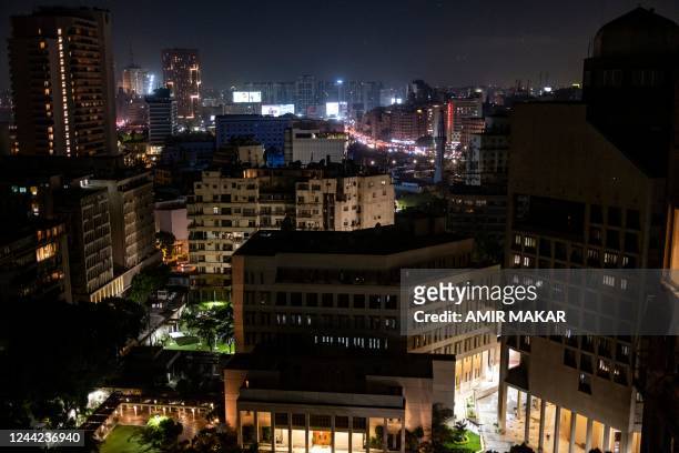 This picture taken on October 25, 2022 shows a view of the US embassy headquarters in the Garden City district of Egypt's capital Cairo, with the...