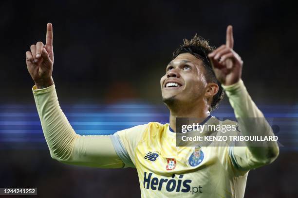 Porto's Brazilian midfielder Evanilson Barbosa celebrates scoring his team's second goal during the UEFA Champions League Group B second leg football...