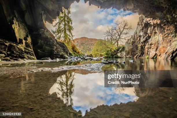 Autumn colours with sunshine and showers from a cave in Rydal, Cumbria on Monday 24th October 2022