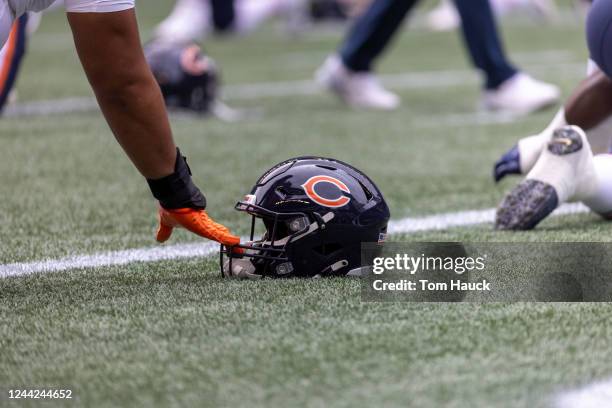 Chicago Bears helmets on the field during an NFL preseason football game between the Seattle Seahawks and the Chicago Bears Thursday, Aug. 18 in...