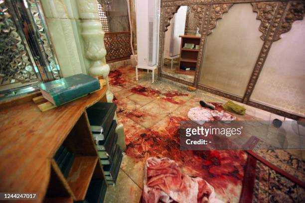 This picture shows blood stains following an armed attack at the Shah Cheragh mausoleum in the Iranian city of Shiraz on October 26, 2022. - At least...