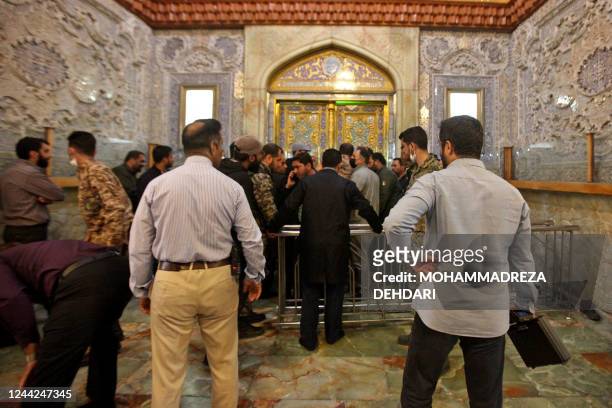 Iranian security forces deploy following an armed attack at the Shah Cheragh mausoleum in the city of Shiraz on October 26, 2022. - At least 15...