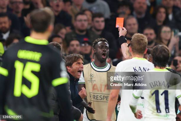 Tottenham Hotspur Head Coach Antonio Conte is shown a red card during the UEFA Champions League group D match between Tottenham Hotspur and Sporting...