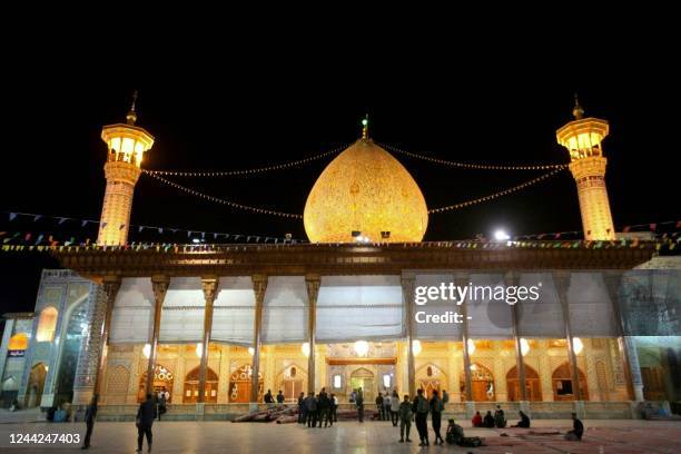 Iranian security forces deploy following an armed attack at the Shah Cheragh mausoleum in the city of Shiraz on October 26, 2022. - At least 15...