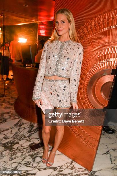 Poppy Delevingne, wearing Miu Miu attends the Fashion Trust Arabia after-party presented at the Miu Miu Club on October 26, 2022 in Doha, Qatar.