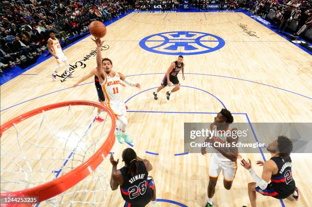 Trae Young of the Atlanta Hawks shoots the ball against the Detroit Pistons on October 26, 2022 at Little Caesars Arena in Detroit, Michigan. NOTE TO...