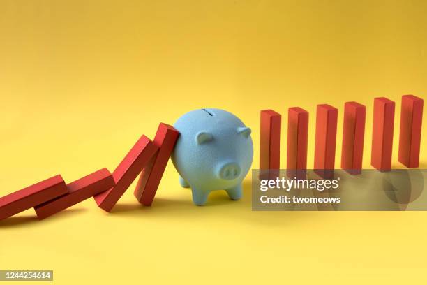 strong financial support concept still life. - dominos falling stock pictures, royalty-free photos & images