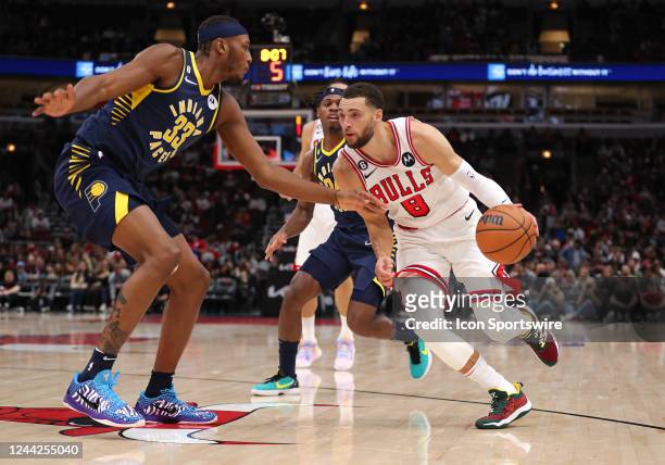 Indiana Pacers center Myles Turner guards Chicago Blackhawks defenseman Jack Johnson during a NBA game between the Indiana Pacers and the Chicago...