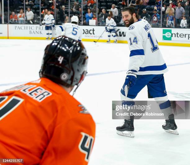 Cam Fowler of the Anaheim Ducks and Pat Maroon of the Tampa Bay Lightning meet on the ice during warm ups prior to the game at Honda Center on...