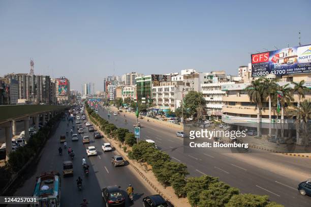 Cars and motorbikes under the Baloch Colony flyover in Karachi, Pakistan, on Monday, Oct. 24, 2022. Pakistan is expected to announce its consumer...