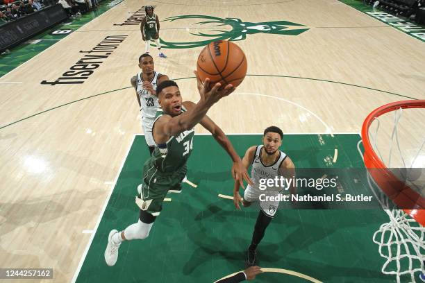 Giannis Antetokounmpo of the Milwaukee Bucks drives to the basket against the Brooklyn Nets on October 26, 2022 at the Fiserv Forum in Milwaukee,...