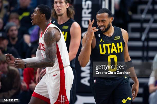 Talen Horton-Tucker of the Utah Jazz signals a two-shot foul as Kenyon Martin Jr. #6 of the Houston Rockets argues the call during the second half of...