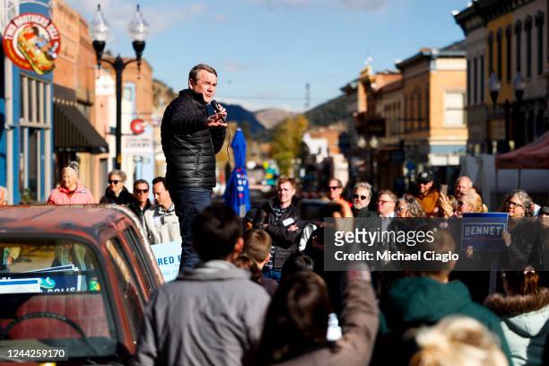 Sen. Michael Bennet speaks to a crowd of supporters on October 26, 2022 in Idaho Springs, Colorado. Bennet is campaigning for re-election against...