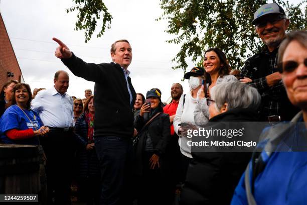Sen. Michael Bennet speaks to supporters at a rally outside Mountain Toad Brewing on October 26, 2022 in Golden, Colorado. Bennet is campaigning for...