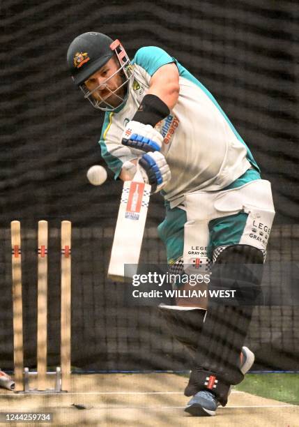 Australia's captain Aaron Finch bowls in the nets during a training session in Melbourne on October 27 ahead of their ICC men's Twenty20 World Cup...