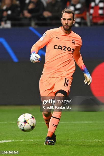 Pau Lopez of Olympique Marseille controls the ball during the UEFA Champions League Group D match between Eintracht Frankurt and Olympique Marseille...