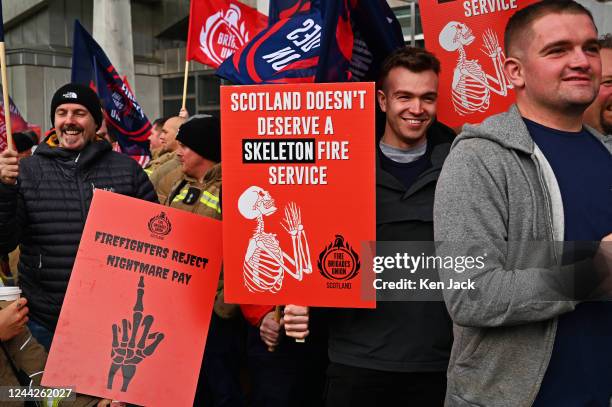 Firefighters demonstrate outside the Scottish Parliament, as part of a UK-wide fire service campaign seeking higher pay and more investment in the...