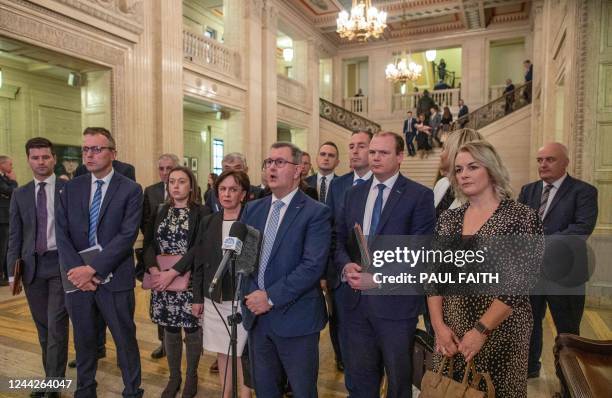 Northern Ireland's Democratic Unionist Party leader Jeffrey Donaldson speaks surrounded by his Assembly team, in the great hall at Stormont Estate in...