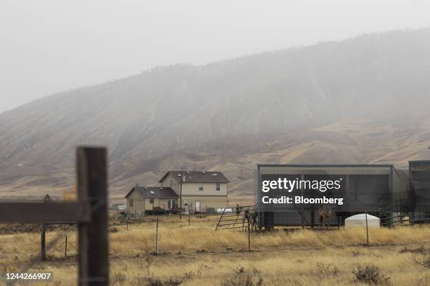 Horses in a barn at a home near Casper, Wyoming, US, on Sunday, Oct. 23, 2022. The American middle class is facing the biggest hit to its wealth in a...