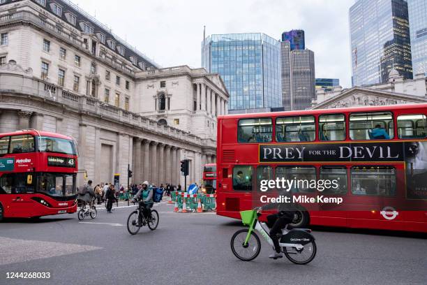 Bus passes the Bank of England adorned with advertising for the horror film which reads 'Prey for the Devil' in the City of London on 12th October...