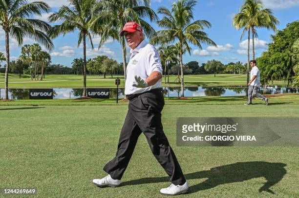 Former US President Donald Trump plays golf at Trump National Doral Miami golf club on October 27, 2022 in Miami, Florida, a day ahead of the 2022...