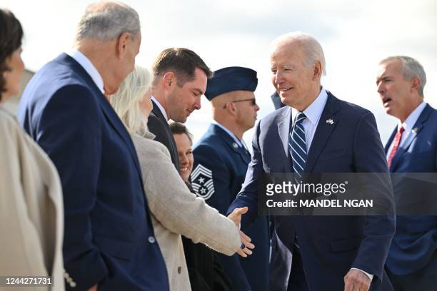 President Joe Biden disembarks Air Force One at Hancock International Airport in Syracuse, New York, on October 27, 2022. - Biden is travelling to...