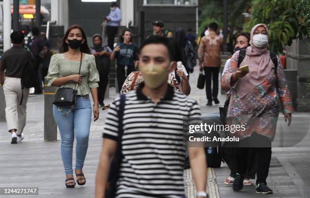 Jakartans wear masks to prevent transmission of Covid-19 during daily activities in Jakarta, Indonesia on October 27, 2022. Indonesian government...