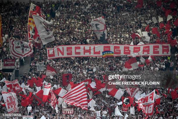 Freiburg fans display banners and flags prior to the UEFA Europa League Group G football match between SC Freiburg and Olympiacos FC in Freiburg im...
