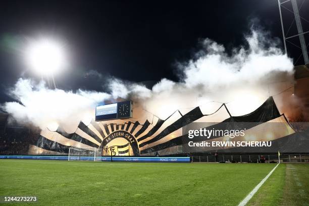 Fans of Sturm Graz burn flares prior to the UEFA Europa League Group F football match between Sturm Graz and Feyenoord Rotterdam in Graz, Austria on...