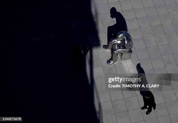 Security guard stands next to the sculpture by artist Charles Ray titled Jeff at the Whitney Museum of American Art in New York on October 27, 2022.