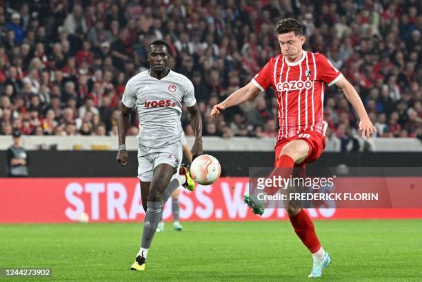 Freiburg's Austrian forward Michael Gregoritsch and Olympiacos' Senegalese defender Ousseynou Ba vie for the ball during the UEFA Europa League Group...