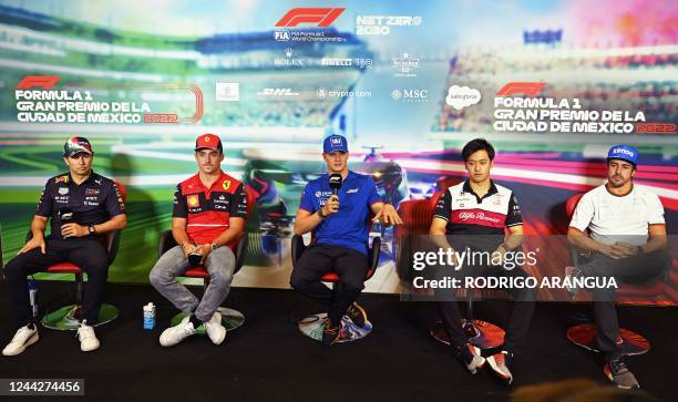 Red Bull's Mexican driver Sergio Perez, Ferrari's Monegasque driver Charles Leclerc, Haas F1 Team's German driver Mick Schumacher, Alfa Romeo's...