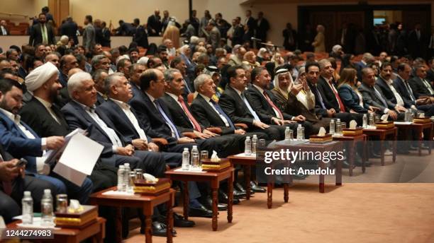 Iraqi officials are seen as Speaker of the Council of Representatives of Iraq Mohamed Al-Halbousi chairs the parliament session at the parliament...