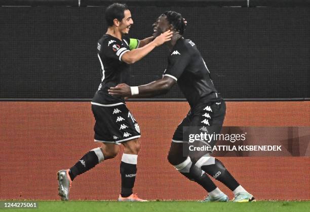 Monaco's French forward Wissam Ben Yedder celebrates with Monaco's French defender Axel Disasi scoring his team's first goal during the UEFA Europa...