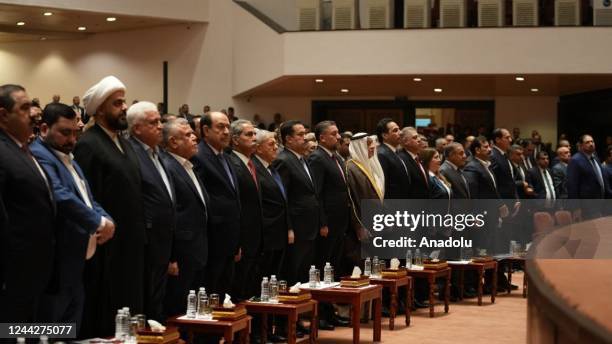 Iraqi officials are seen as Speaker of the Council of Representatives of Iraq Mohamed Al-Halbousi chairs the parliament session at the parliament...