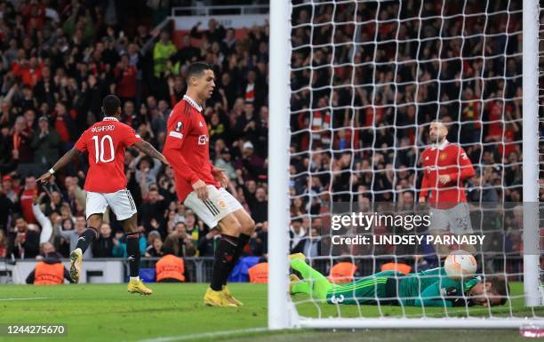 Manchester United's English striker Marcus Rashford celebrates scoring the team's second goal during the UEFA Europa League Group E football match...