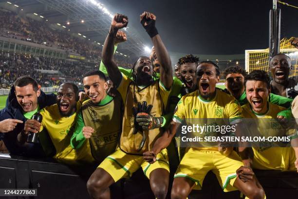 Nantes' players celebrate their victory at the end of the UEFA Europa League Group D football match between FC Nantes and Qarabag FK at The Beaujoire...