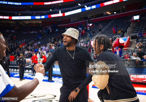 Nerlens Noel of the Detroit Pistons talks to Luguentz Dort and Shai Gilgeous-Alexander of the Oklahoma City Thunder after the game on October 11,...