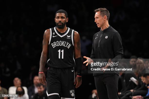 Kyrie Irving talks to Head Coach Steve Nash of the Brooklyn Nets during the game against the Dallas Mavericks on October 27, 2022 at Barclays Center...