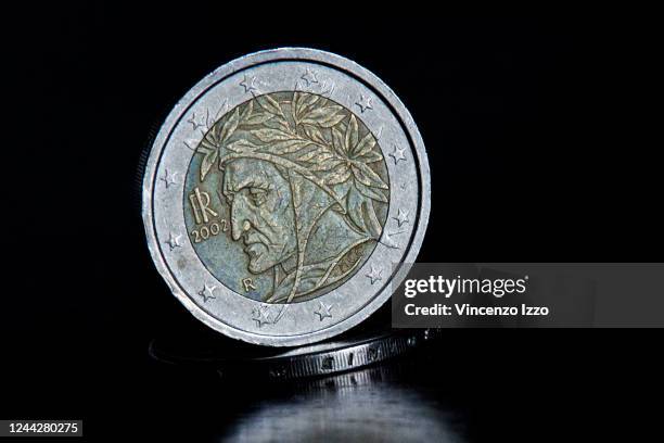 In this photo illustration, a two euro coin from 2002 dedicated to the poet Dante Alighieri, one of the most famous and widespread in Europe.