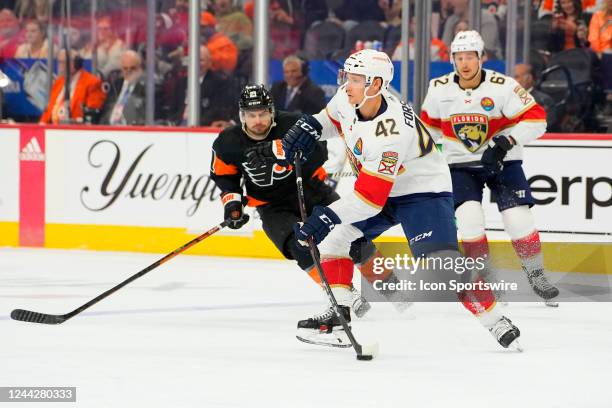 Florida Panthers Defenceman Gustav Forsling passes the puck during the first period of the National Hockey League game between the Florida Panthers...