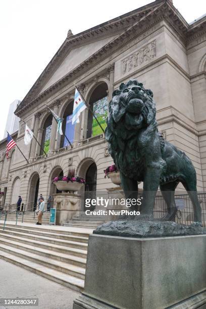 Lion sculpture is seen in front of the Art Institute of Chicago in Chicago, United States on October 17, 2022.