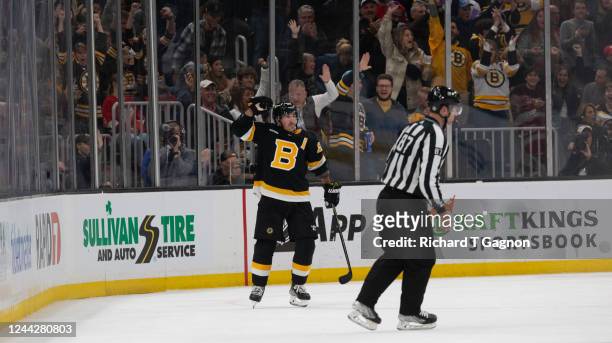 Brad Marchand of the Boston Bruins celebrates his goal against the Detroit Red Wings during the second period at the TD Garden on October 27, 2022 in...
