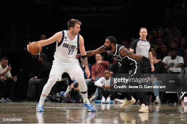 Luka Doncic of the Dallas Mavericks dribbles the ball during the game against Kyrie Irving of the Brooklyn Nets on October 27, 2022 at Barclays...