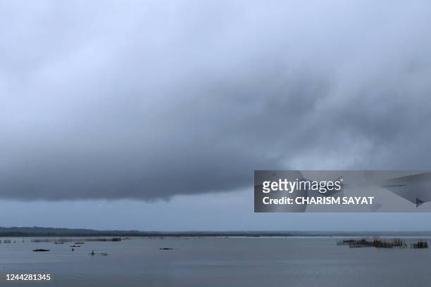 Clouds gather over the bay in Sorsogon, in the Philippines' Sorsogon province on October 28 ahead of the expected landfall of Tropical Storm Nalgae.