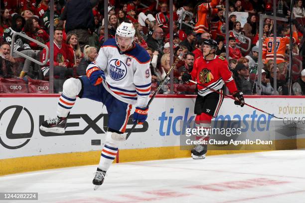 Connor McDavid of the Edmonton Oilers reacts after scoring his third goal of the night for a hat-trick in the third period against the Chicago...