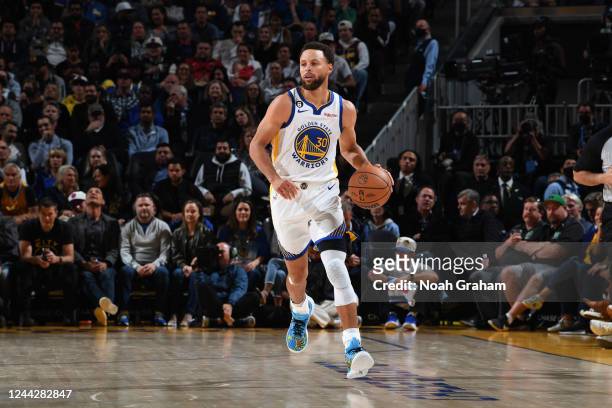 Stephen Curry of the Golden State Warriors handles the ball during the game against the Miami Heat on October 27, 2022 at Chase Center in San...