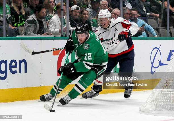 Dallas Stars center Radek Faksa skates around Washington Capitals defenseman John Carlson during a NHL game between the Washington Capitals and the...