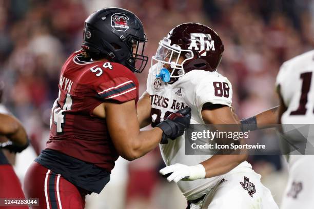 South Carolina Gamecocks offensive lineman Jovaughn Gwyn blocks Texas A&M Aggies defensive lineman Walter Nolen during a college football game on...