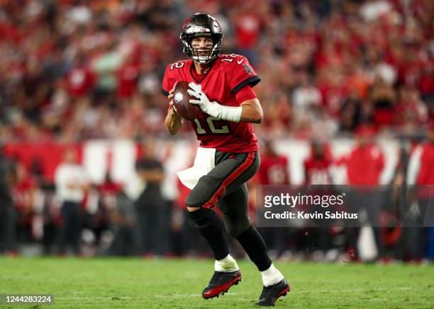 Tom Brady of the Tampa Bay Buccaneers drops back to pass during the fourth quarter of an NFL football game against the Baltimore Ravens at Raymond...